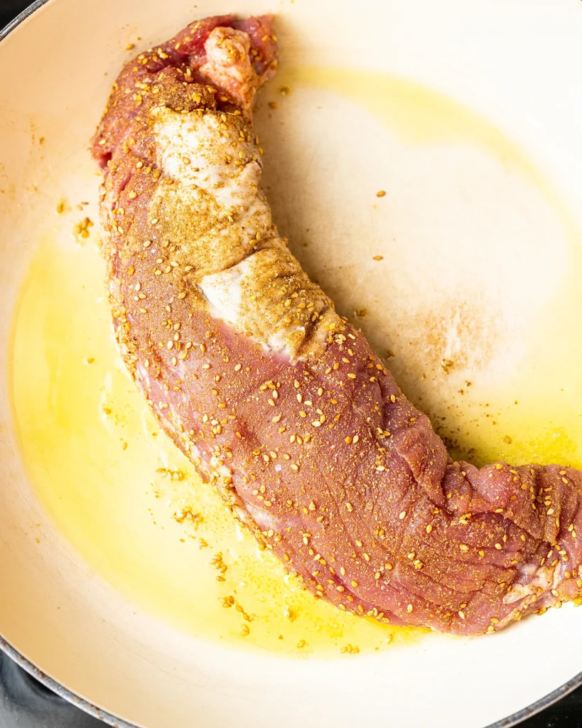 Add pork to hot skillet