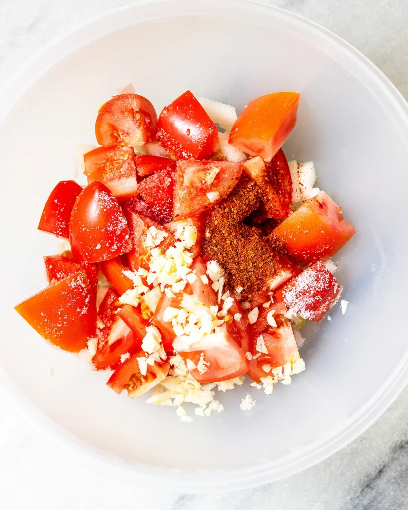 Marinate the tomatoes