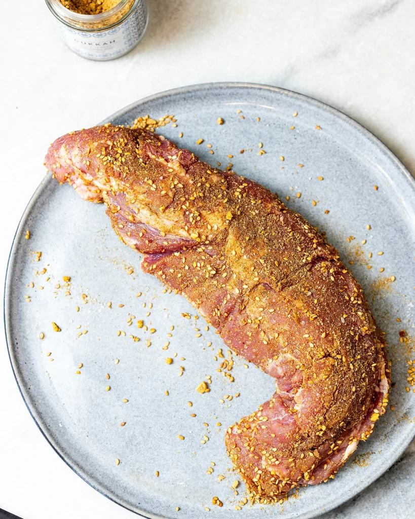 Season pork with Dukkah