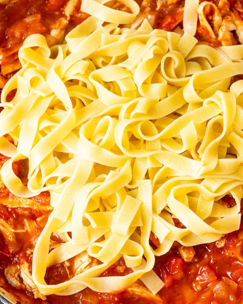 Add cooked pasta