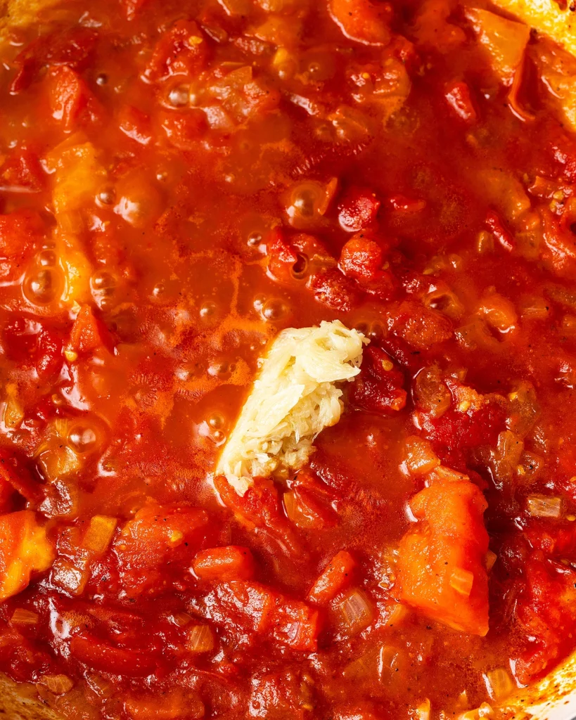 Add garlic to sauce