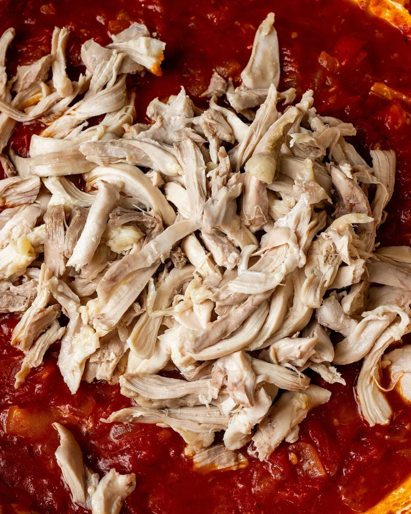 Add shredded chicken