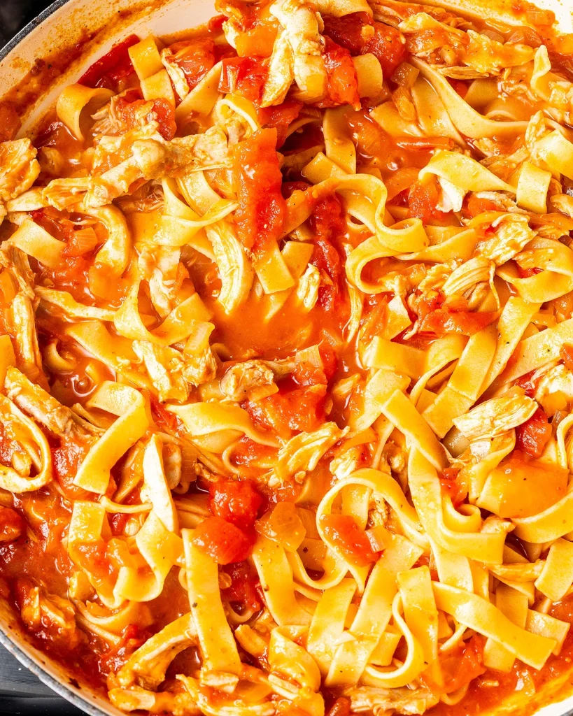 Toss pasta with chicken and sauce