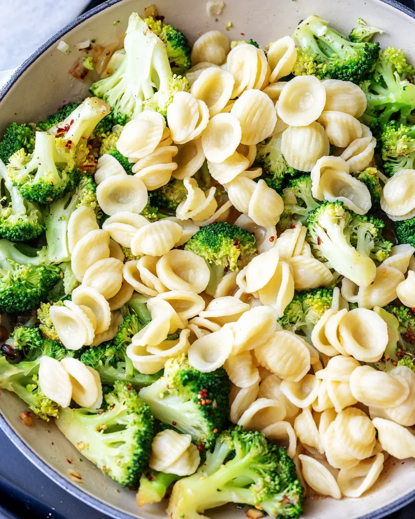 Add cooked orecchiette